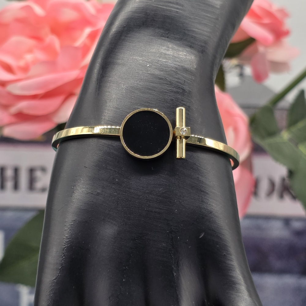 Elegant Gold and Black Bracelet